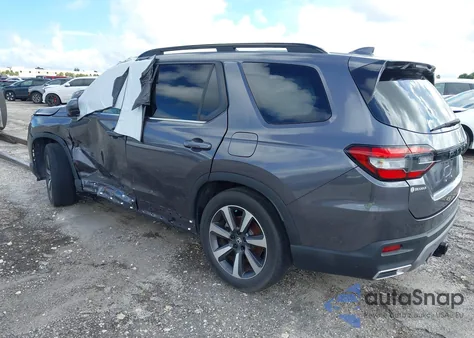 2023 Honda Pilot 2Wd Touring z USA, uszkodzony, nr VIN 5FNYG2H76PB008790
